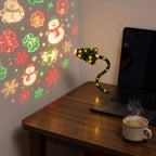 Projector on a desk casting holiday patterns on the wall