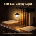 Lantern glowing over a desk of books