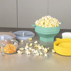 Collapsible popcorn bowl full of popcorn